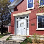 Formal entrance to original brick home.